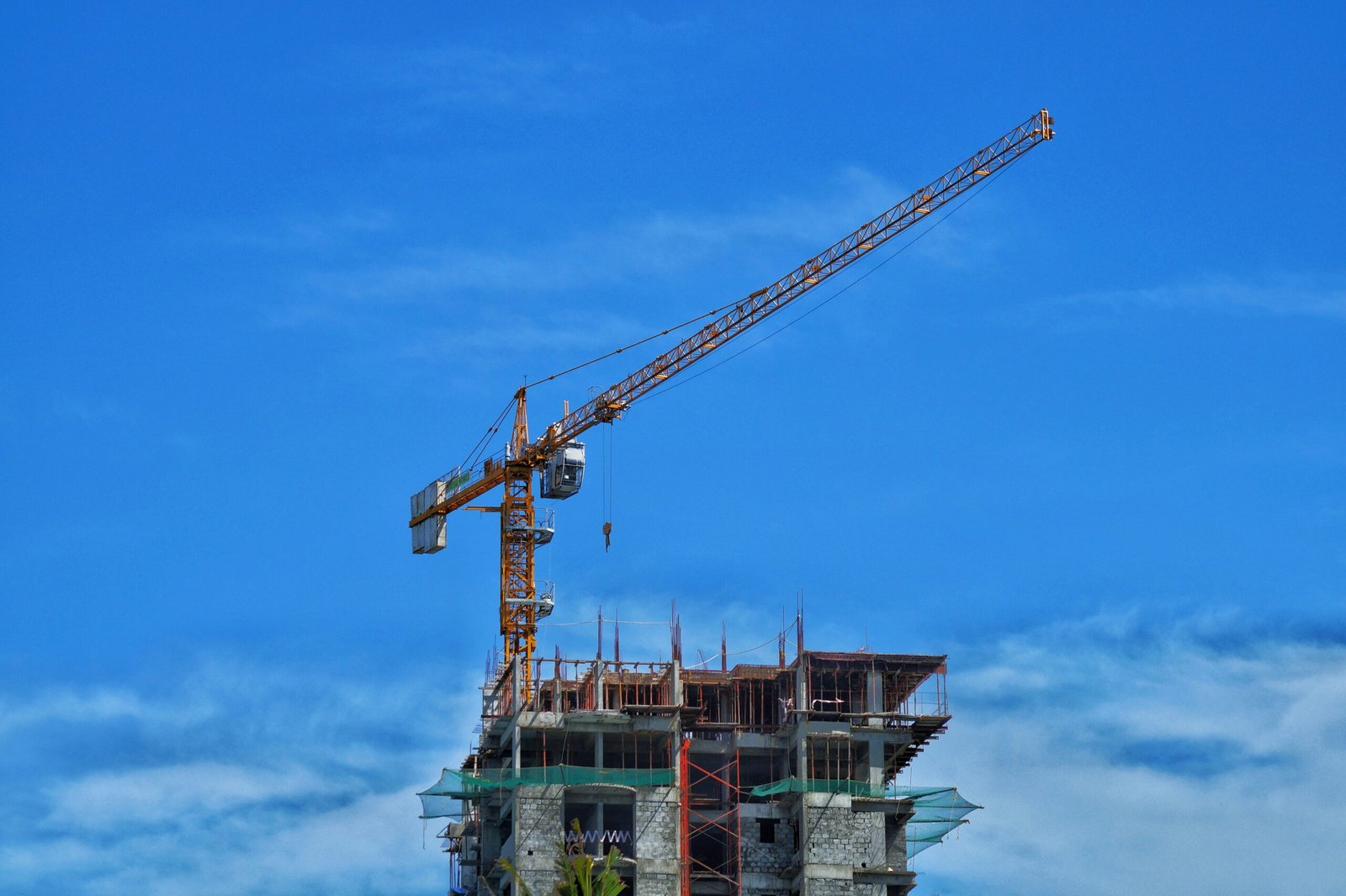 a crane lifting a building